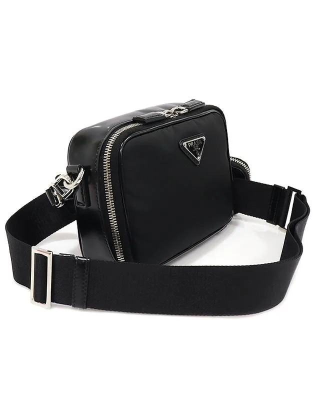 2VH070 Black Re nylon Brushed Leather Silver Triangle Brick Cross Bag