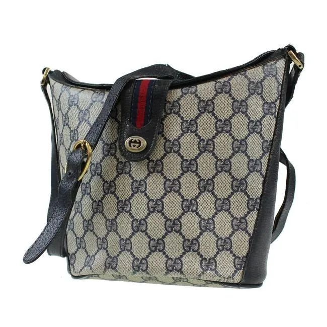RARE, Gucci, navy blue Guccissima print leather, bucket bag w red & navy striped, top strap & gold GG logo accent